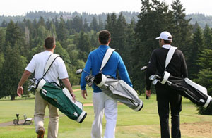 men carying golf bags