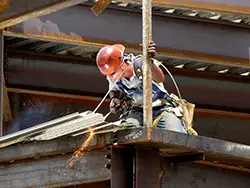 man welding