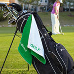 golf towel hanging from golf bag