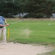 Golfer uding a wedge in the sand