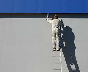 Painter at risk of falling