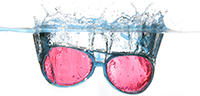 sunglasses falls and floats in water