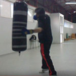 punching a heavy bag