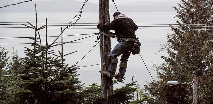 Lineman wearing safety boots