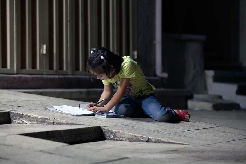 kid on street at night